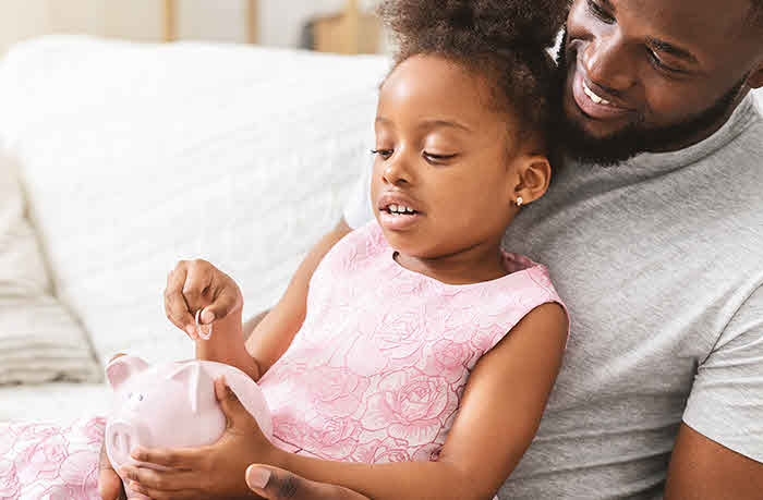 Father sitting with daughter